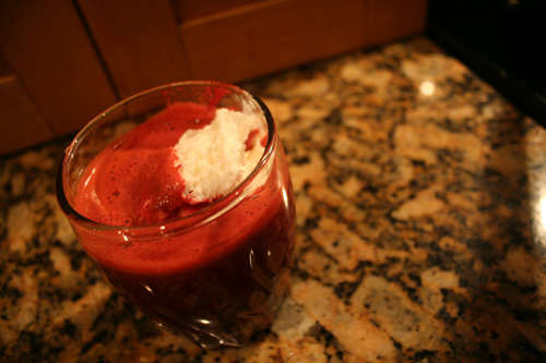 A nice glass of some juice my dad made with a scoop of Edy's Tart Honey ice cream.
